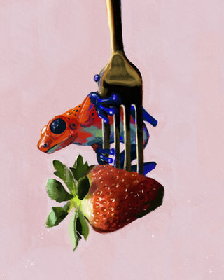 Strawberry poison dart frog on a strawberry