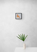 Load image into Gallery viewer, Orange Seated Figure
